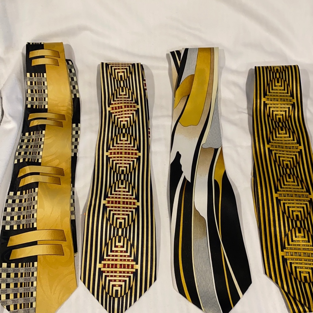 Lot of four coordinating men’s ties. Wedding party?